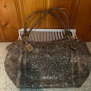 Frye handbag, brown with studs on front of bag, leather, new condition
